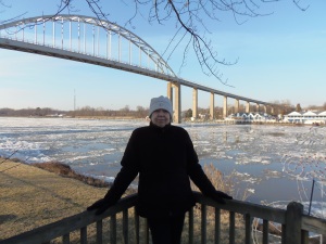 Carol in front of the ice filled Chesapeake and Delaware Canal, 1-9-14